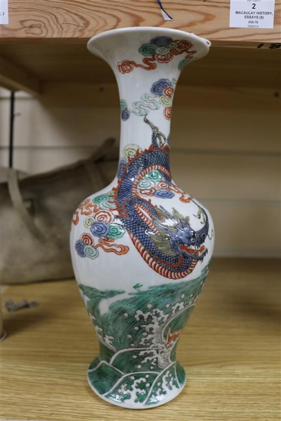A Chinese famille verte vase decorated with a dragon, late 19th century H 30cm